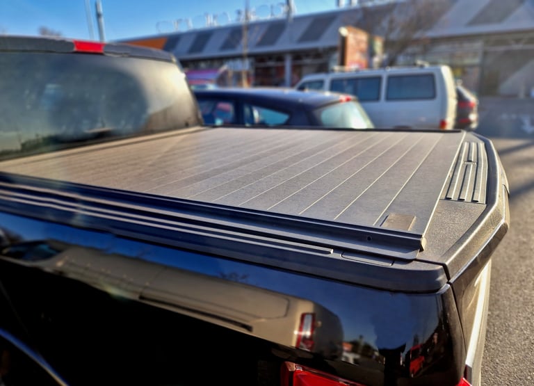 Tonneau cover with tail gate locking system for secure cargo