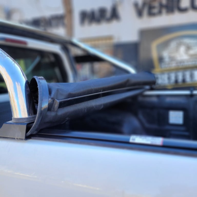 Close-up of a police vehicles light bar mounted on roof with blurred station background